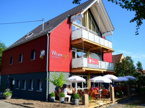 Гостиница Winzercafe Neipperg Ferienwohnungen  Бракенхайм